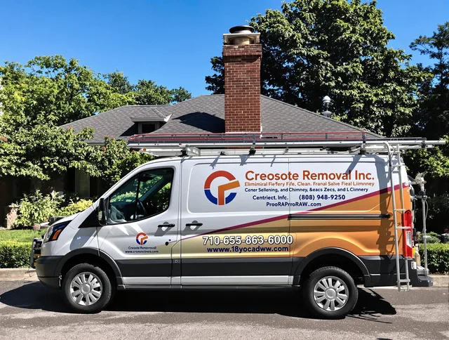 Palm Bay Chimney Sweep technician removing creosote safely in Palm Bay, FL