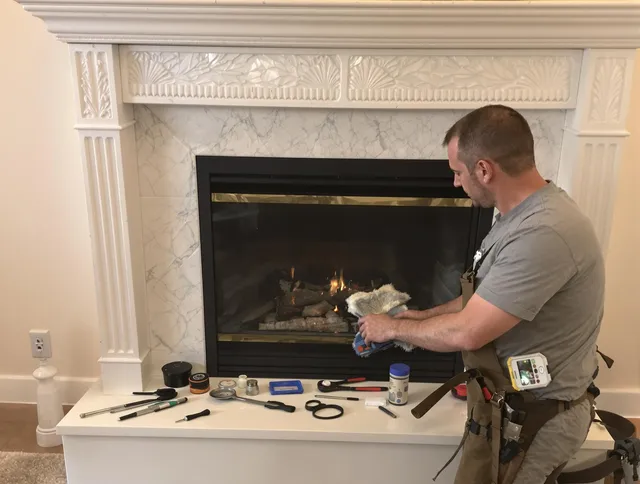 Palm Bay Chimney Sweep performing fireplace maintenance in Palm Bay, FL